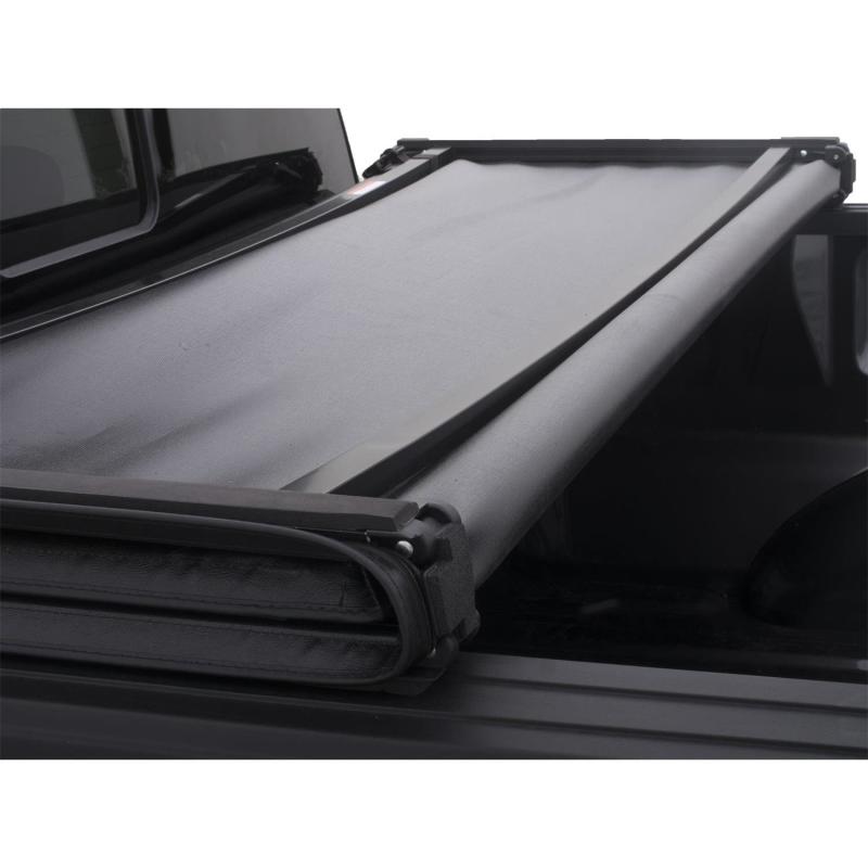 Lund 05-12 Dodge Dakota (6.5ft. Bed w/o Utility TRack) Genesis Tri-Fold Tonneau Cover - Black