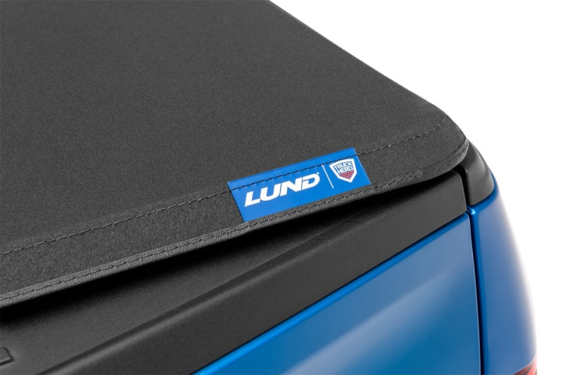 Lund 04-14 Ford F-150 (5.5ft. Bed) Genesis Elite Tri-Fold Tonneau Cover - Black