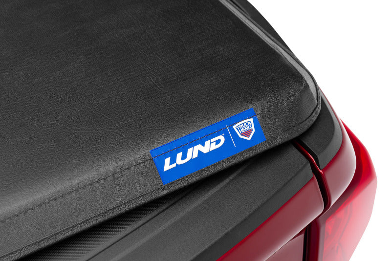 Lund 04-06 Chevy Silverado 1500 Fleetside (5.8ft. Bed) Hard Fold Tonneau Cover - Black